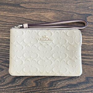 Coach Platinum Cream Signature Embossed Patent Leather Wristlet w/ Strap